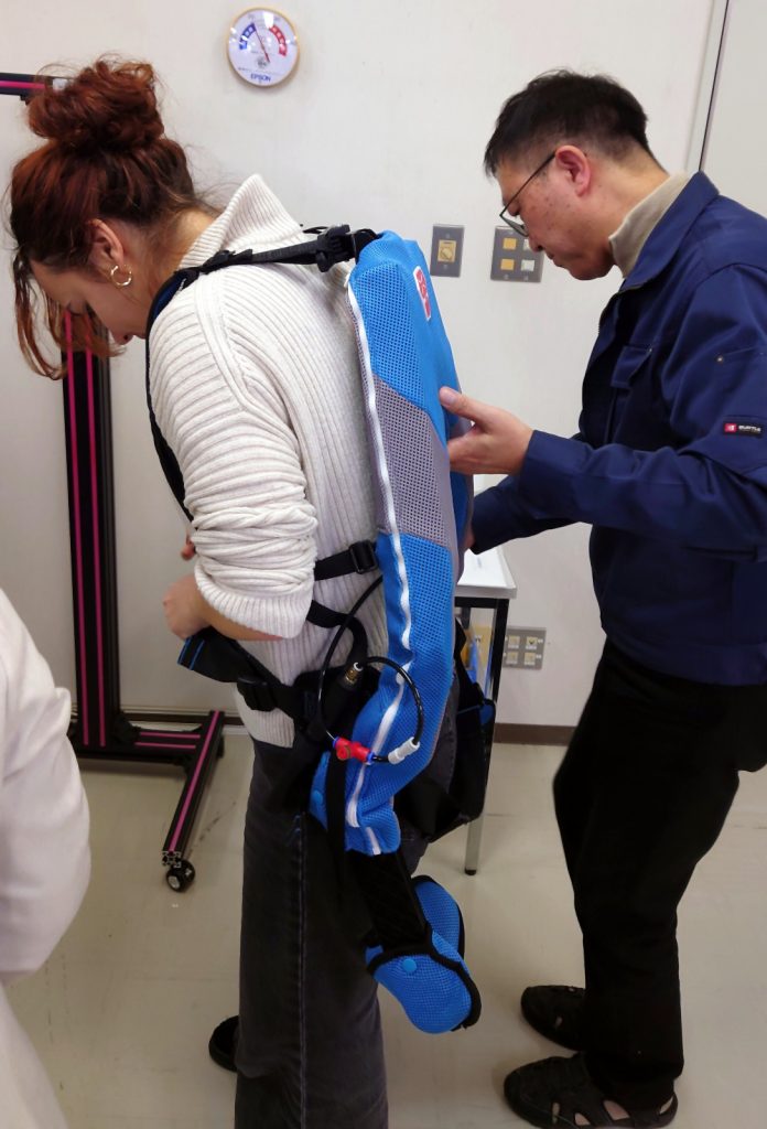 Laura trying an exoskeleton